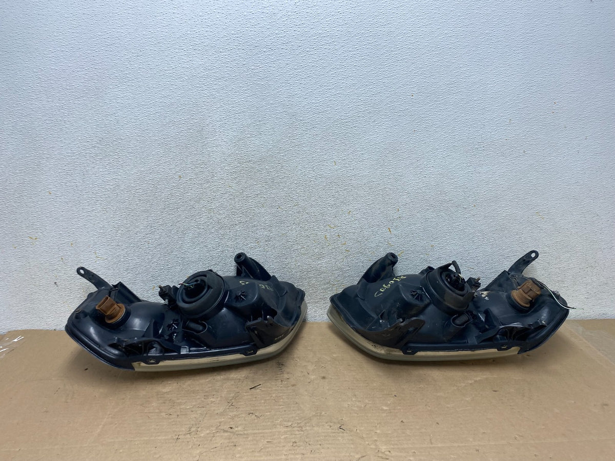 2001 2002 2003 2004 Mazda Tribute Left+Right Side Set Headlights AI0905 DW9