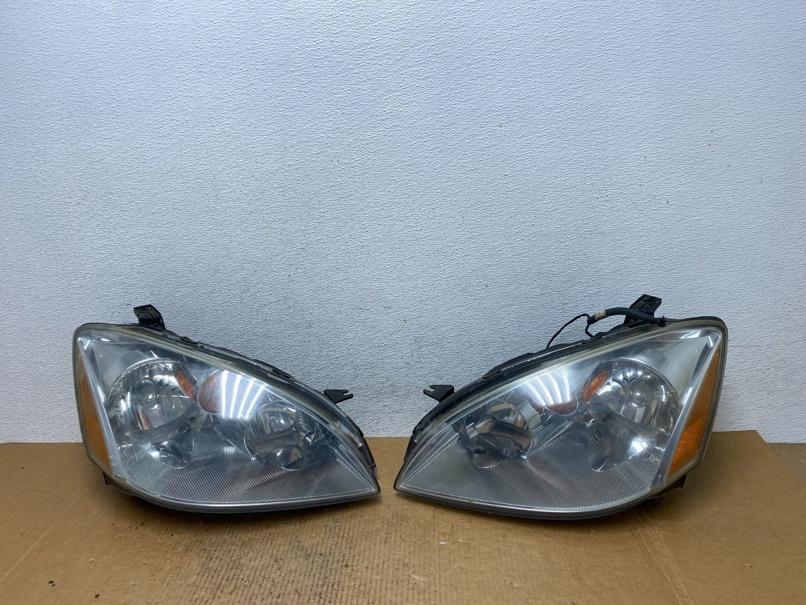 2002 to 2004 Nissan Altima Left+Right Side Set Halogen Headlights AE1146 DW0