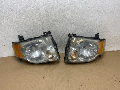 2008 to 2012 Ford Escape Headlights Left+Right Side Set Halogen AH5727 DW0