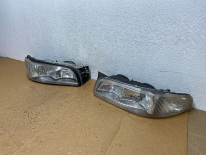 1997 to 1999 Buick Lesabre Left+Right Halogen Headlights AE0596 DW1