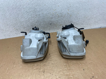 1999-2004 Nissan Pathfinder Left+Right Side Set Halogen Headlights AI6516 DW7