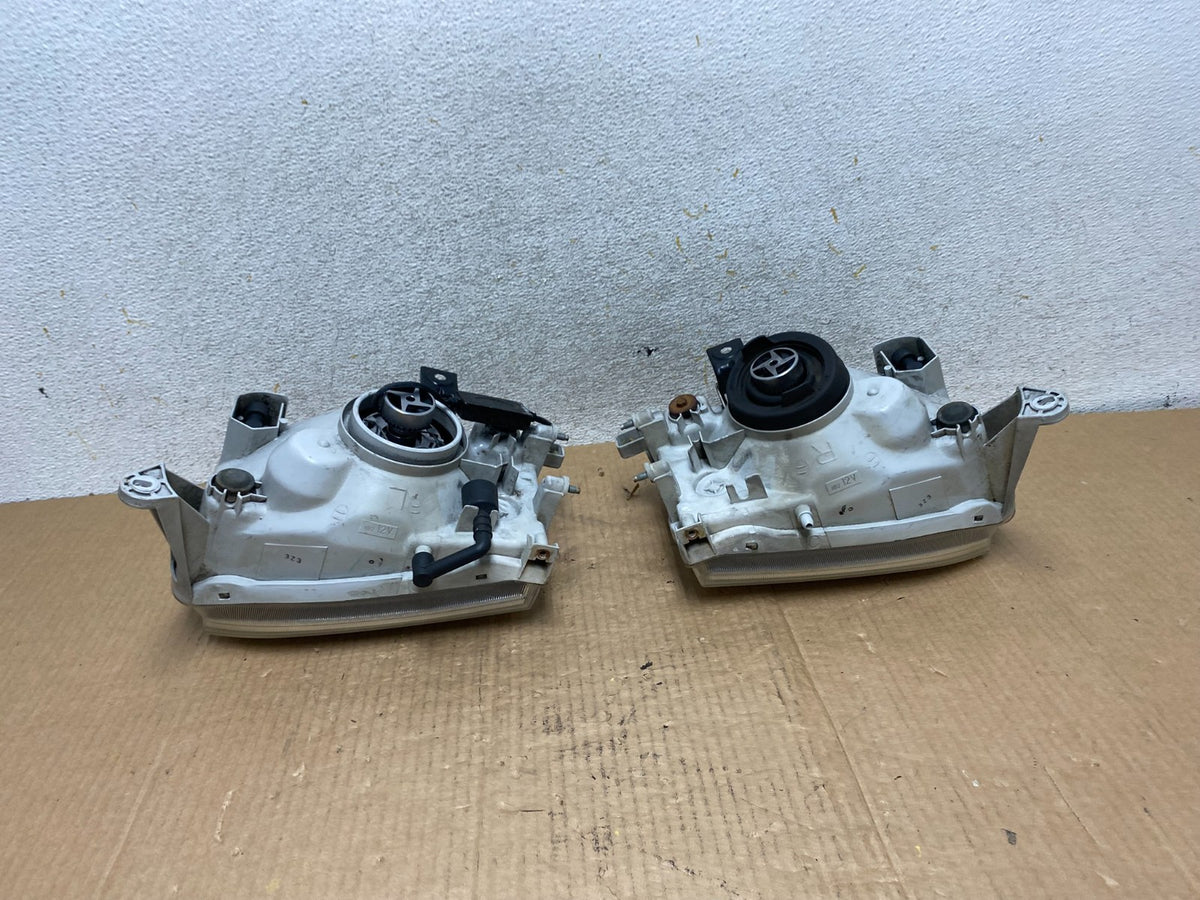 1999-2004 Nissan Pathfinder Left+Right Side Set Halogen Headlights AI6516 DW5