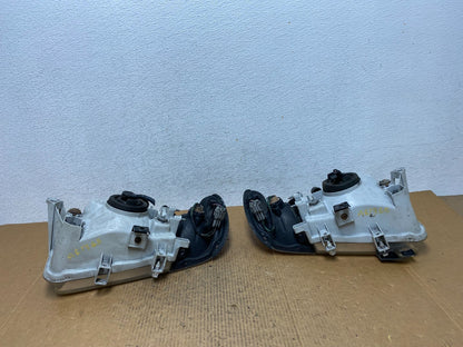 1999-2004 Nissan Pathfinder Left+Right Side Set Halogen Headlights AE1365 DW8