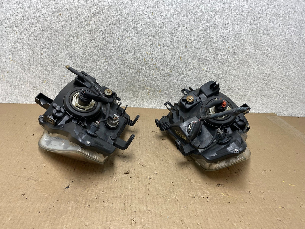 2008 to 2012 Nissan Pathfinder Halogen Headlights Left+Right AH5958 DW9
