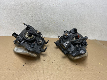 2008 to 2012 Nissan Pathfinder Halogen Headlights Left+Right AH5958 DW9