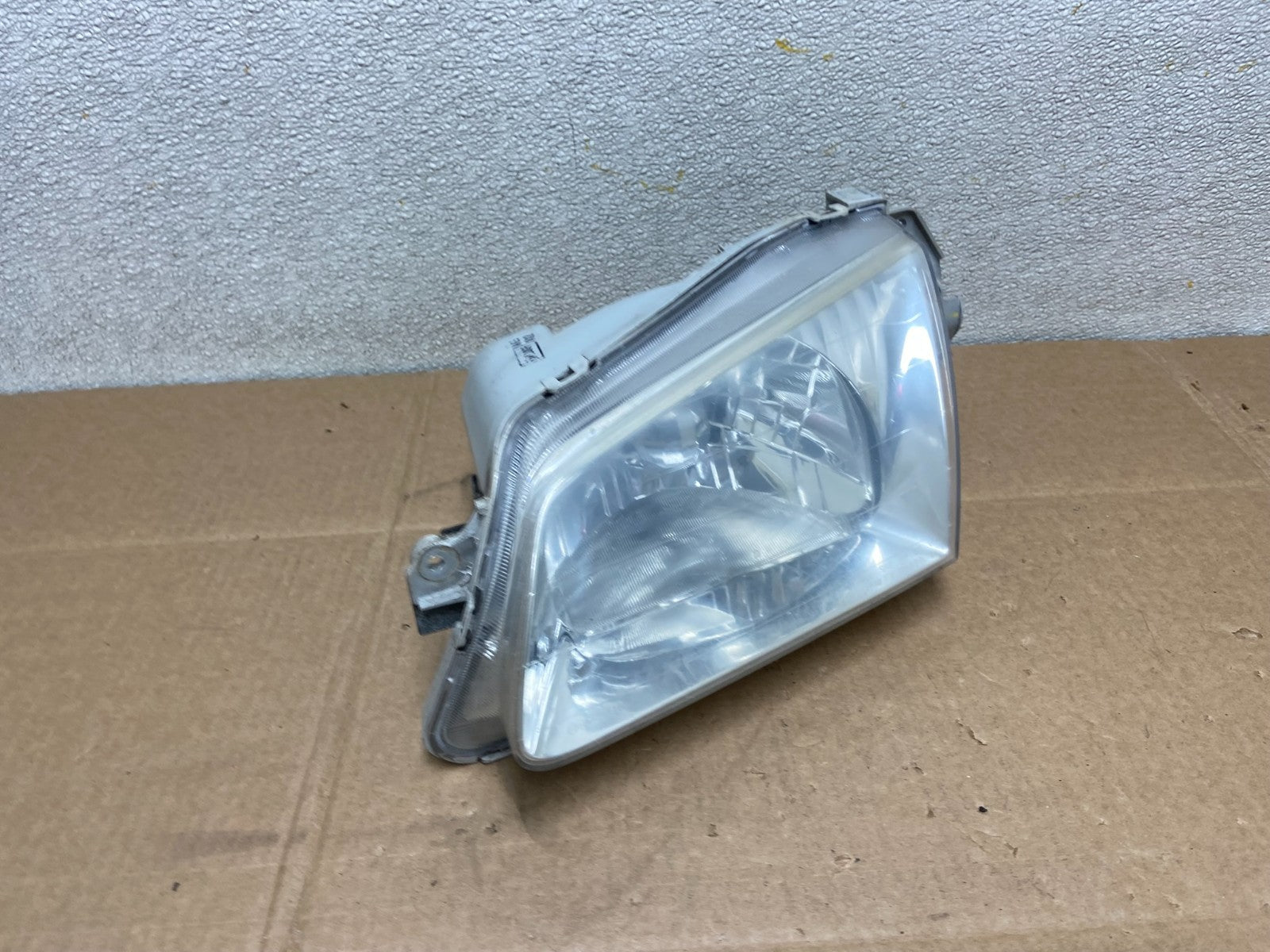 1999 to 2000 Mazda Protege Left Driver LH Side Headlight OEM Y8525 DW2