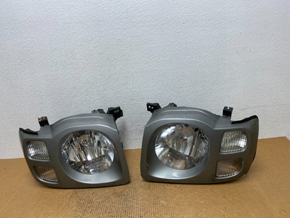 2002 2003 2004 Nissan Xterra Left+Right Side Headlights AE0292 DW0