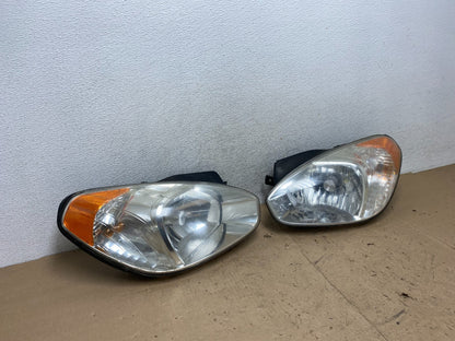 2006 to 2011 Hyundai Accent Sedan Left+Right Halogen Headlights AG5685 DW2