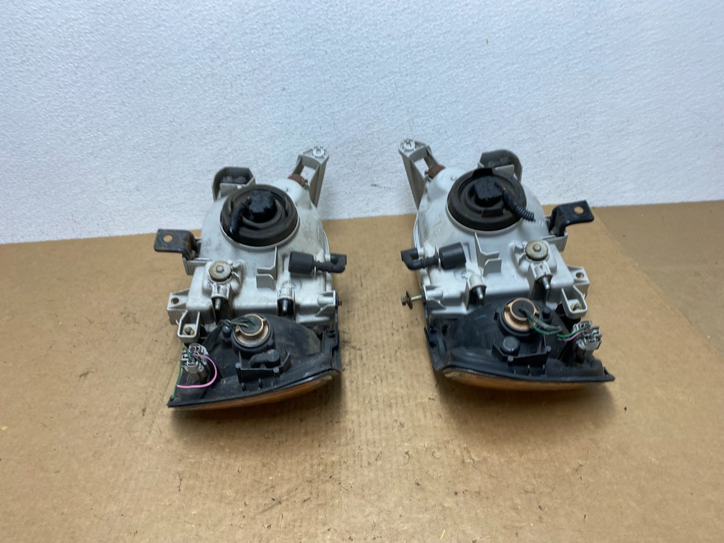 1999-2004 Nissan Pathfinder Left+Right Side Set Halogen Headlights Oem AC3301 DW7