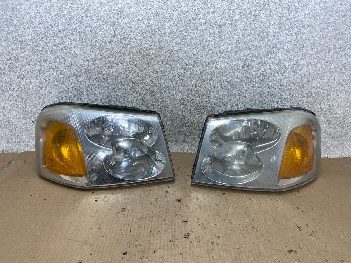2002 to 2009 Gmc Envoy Left+Right Set Headlights Halogen AH5964 DW0
