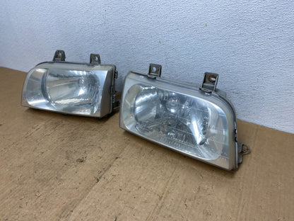 1998 to 2002 Kia Sportage Left+Right Halogen Headlights AD0635 DW1