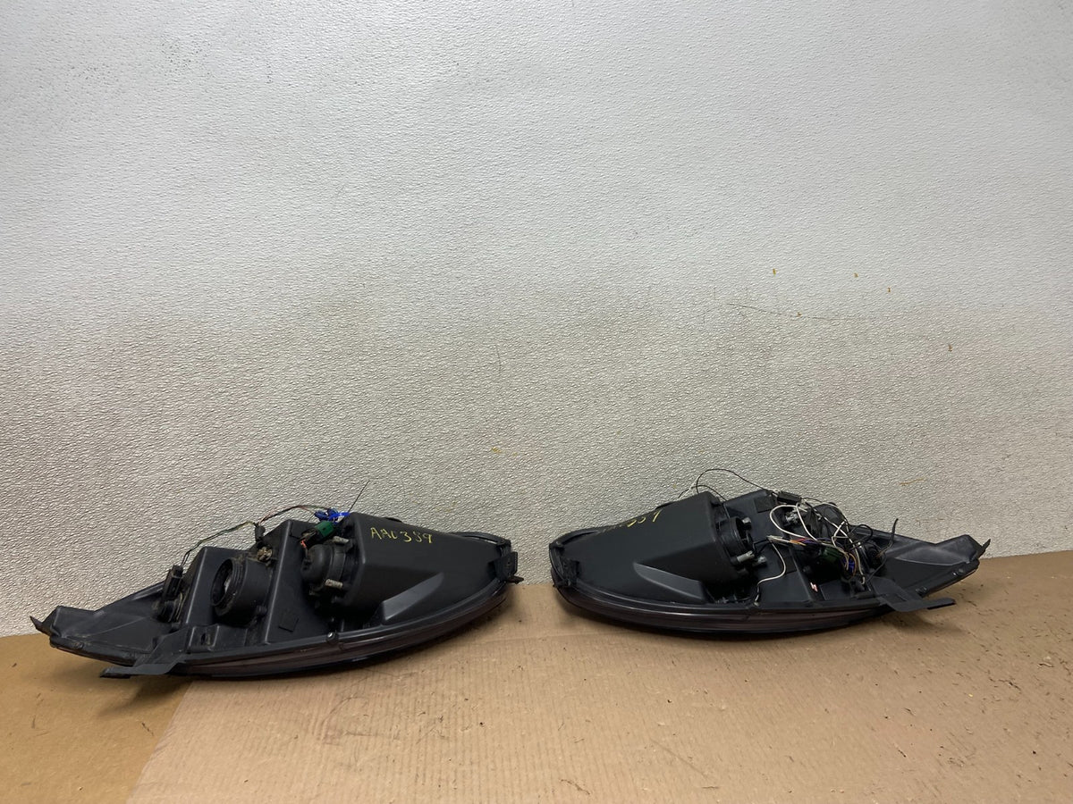 2006 - 2007 Mitsubishi Eclipse Left+Right Side Halogen Headlights AA0389 DW7
