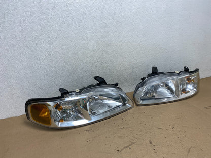 2000 to 2003 Nissan Sentra Front Left+Right Side Headlights AG4309 DW2