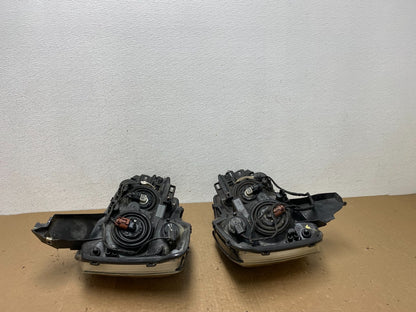 2004 to 2007 Nissan Armada Left+Right Side Set Headlights AC5970 DW11