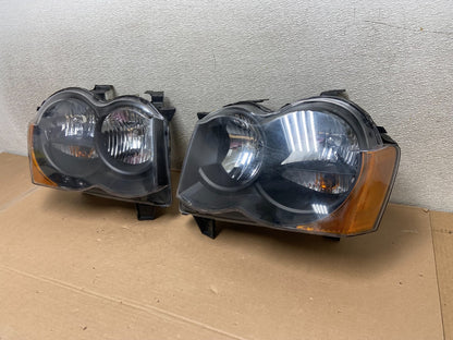 2009-2010 Jeep Grand Cherokee Left+Right Set Halogen Headlights AA9867 DW1