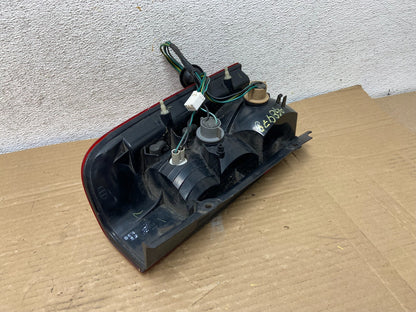 2002 2003 2004 Nissan Xterra Left Driver Side Tail Light AG8978 DW4