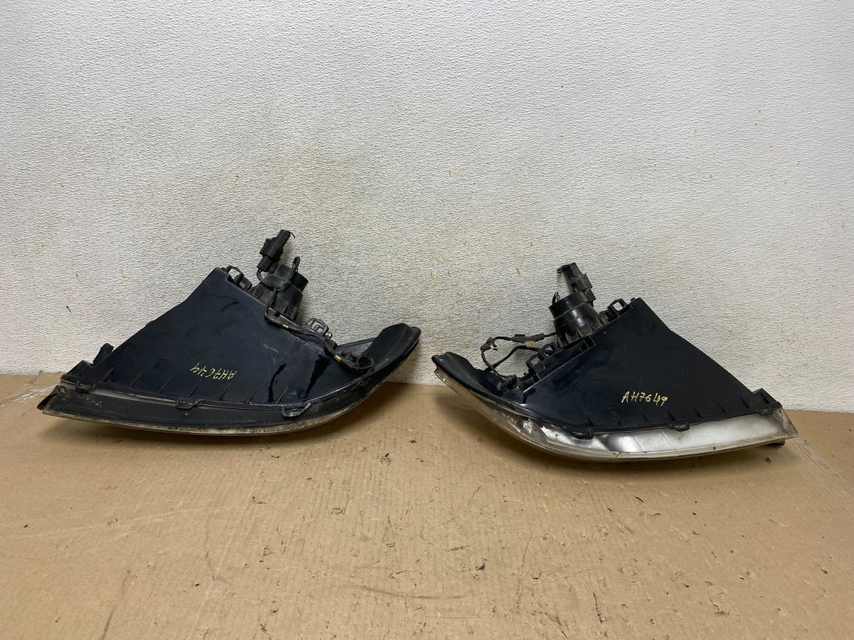 2000 to 2007 Ford Taurus Left+Right Side Halogen Headlights AH7649 DW5