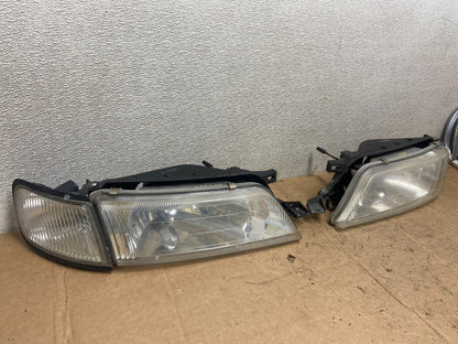 1997 to 1999 Nissan Maxima Left+Right Side Headlights Halogen OEM AA35772