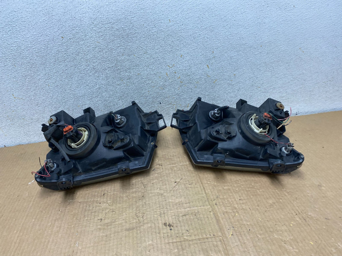 2005-2015 Nissan Xterra Driver Left+Right Side Set Headlights AI8164 DW5