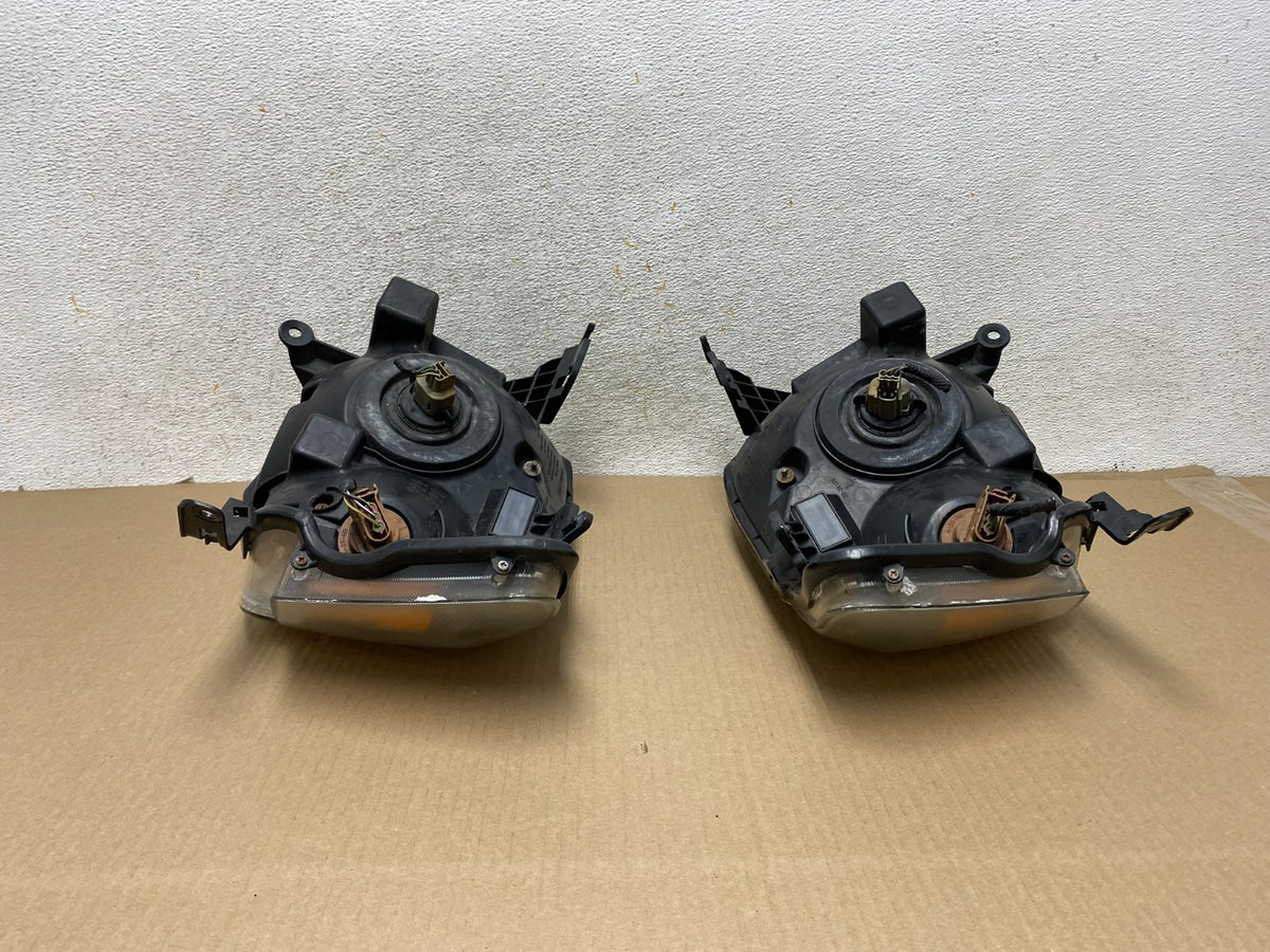 2008 to 2011 Mercury Mariner Left+Right Side Halogen Headlights AH4346 DW7