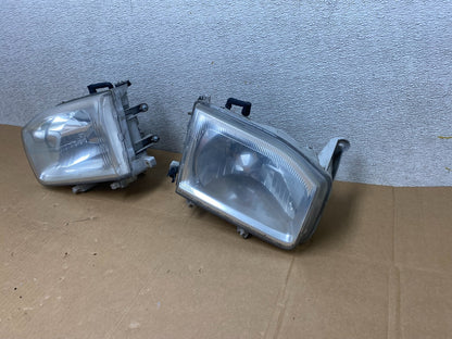 1999-2004 Nissan Pathfinder Left+Right Side Set Halogen Headlights V4820 DW1