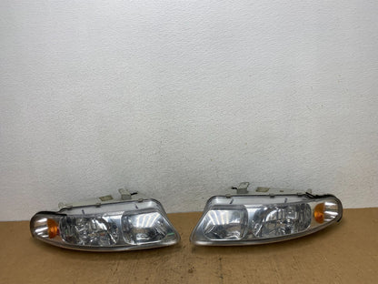 1995 to 1996 Chrysler Sebring Coupe Left+Right Side Headlights AD0514 DW0