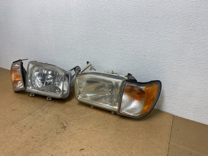 1999-2004 Nissan Pathfinder Left+Right Side Set Halogen Headlights Oem AC3325 DW1