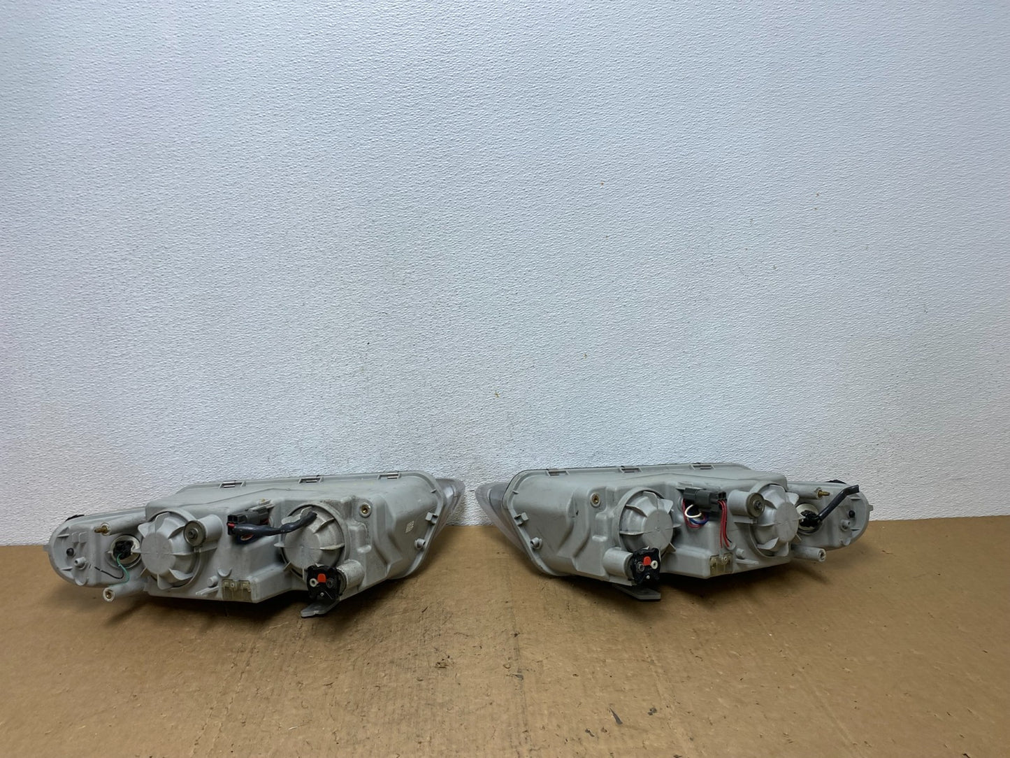 1995 to 1996 Chrysler Sebring Coupe Left+Right Side Headlights AD0514 DW5