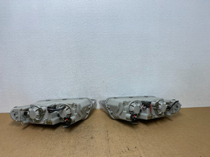 1995 to 1996 Chrysler Sebring Coupe Left+Right Side Headlights AD0514 DW5