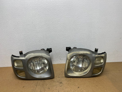 2002 2003 2004 Nissan Xterra Left+Right Side Headlights OEM AC3484 DW0
