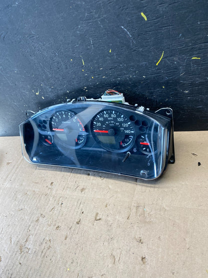 2005 Nissan Xterra Frontier Speedometer Cluster Gauge OEM R8876 DG2