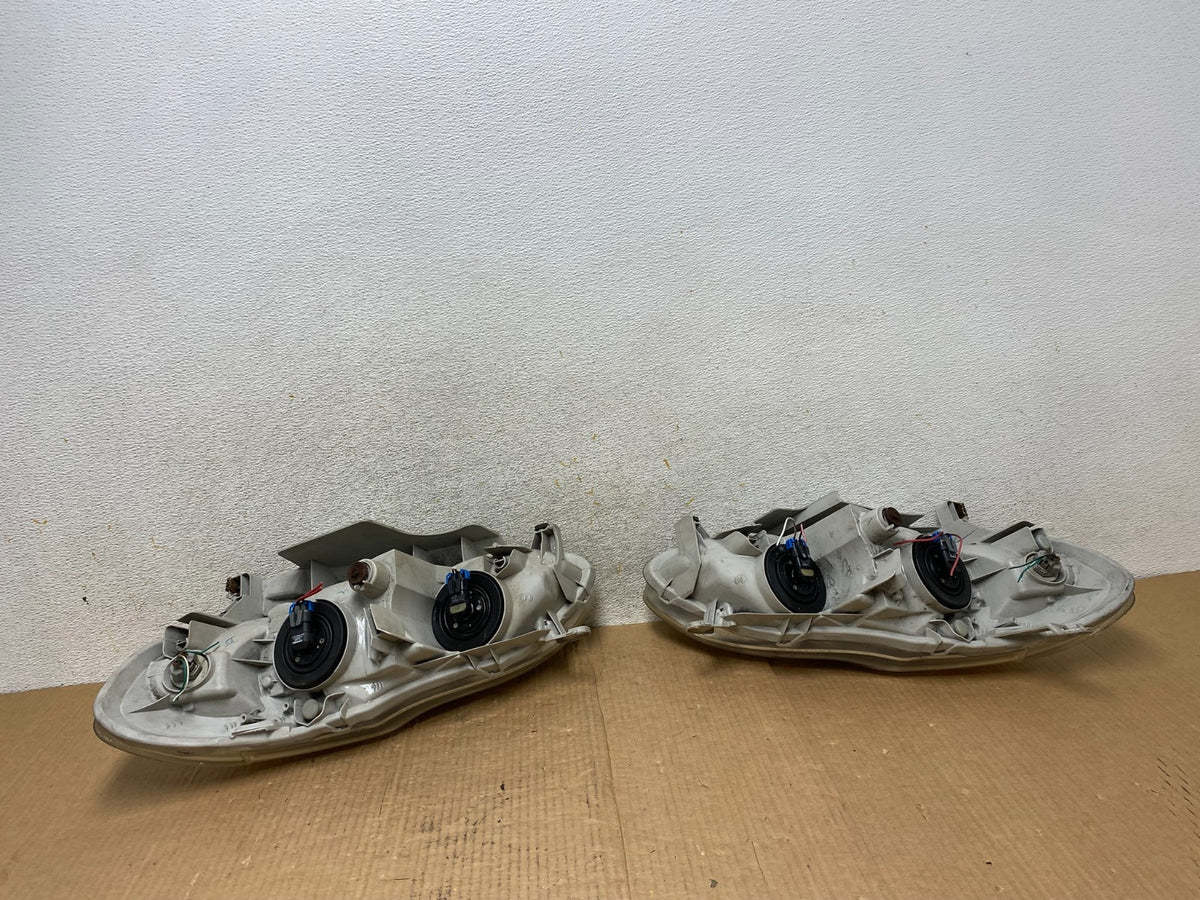 2003 to 2004 Toyota Corolla Left+Right Side Set Headlights AI6514 DW8