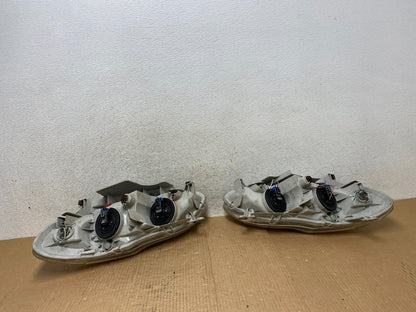 2003 to 2004 Toyota Corolla Left+Right Side Set Headlights AI6514 DW8