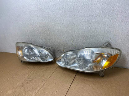 2003 to 2004 Toyota Corolla Left+Right Side Set Headlights AI6514 DW1