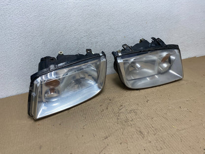 2002 to 2004 Volkswagen Jetta Left+Right Headlights AG6533 DW2