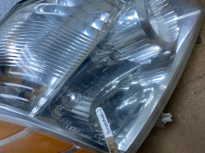 2004 to 2007 Nissan Armada Left+Right Side Set Headlights AD6132 DW3