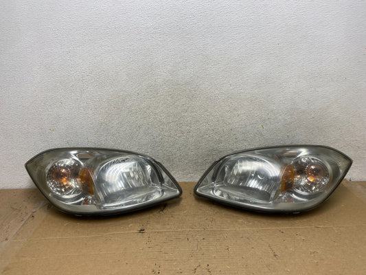 2005 - 2010 Chevrolet Cobalt Sedan Left+Right Headlights AH8131 DW0