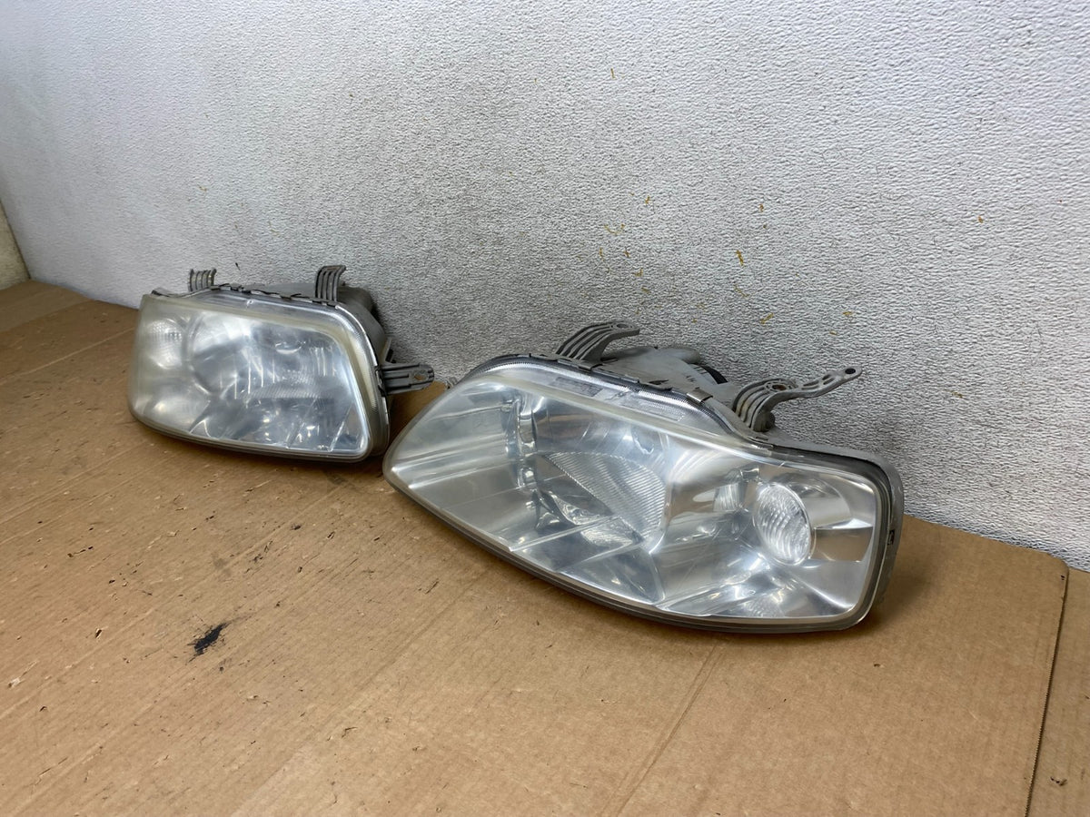 2004 - 2006 Chevrolet Aveo Hatchback Left+Right Headlights Halogen AI8872 DW1