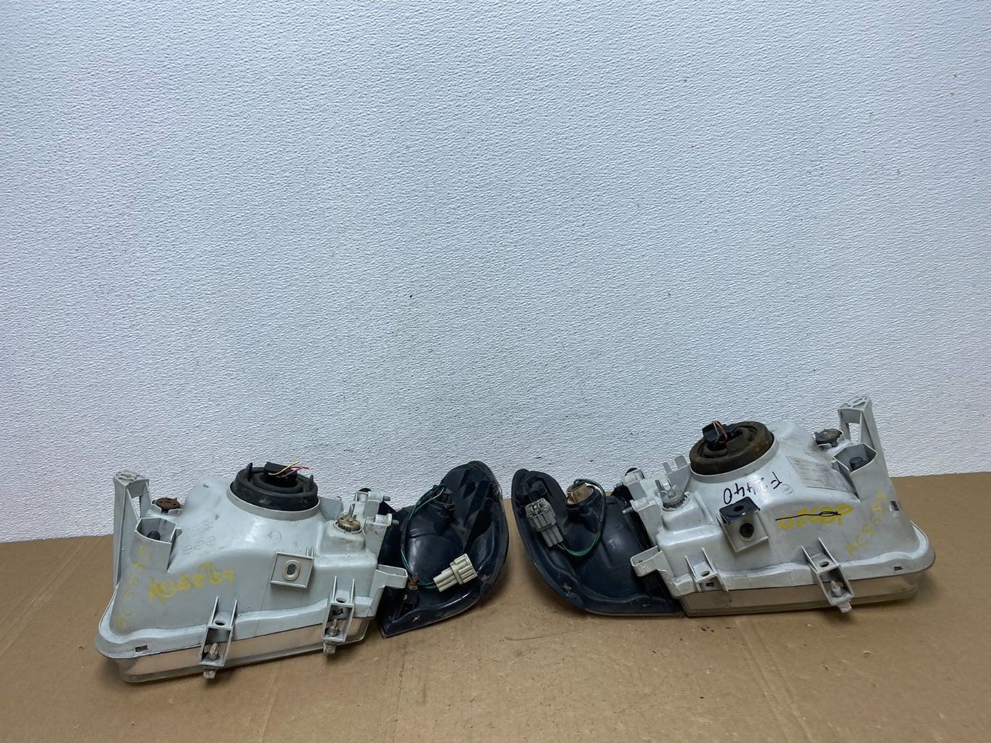 1999-2004 Nissan Pathfinder Left+Right Side Set Halogen Headlights AC5655 DW6