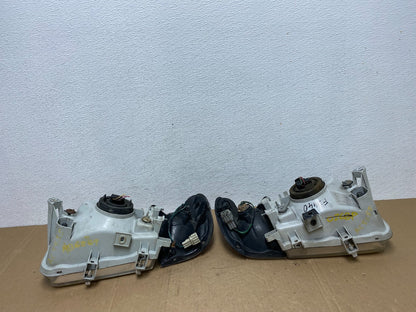 1999-2004 Nissan Pathfinder Left+Right Side Set Halogen Headlights AC5655 DW6