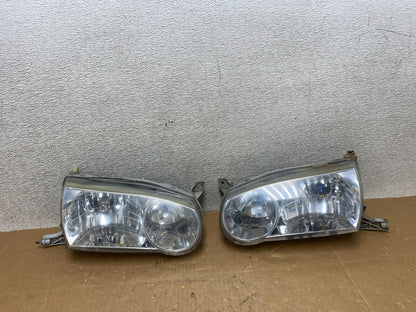 2001-2002 Toyota Corolla Left+Right Side Halogen Headlights V4977 DW0