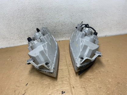 2002 to 2005 Kia Sedona Left+Right Side Headlights AI8165 DW11