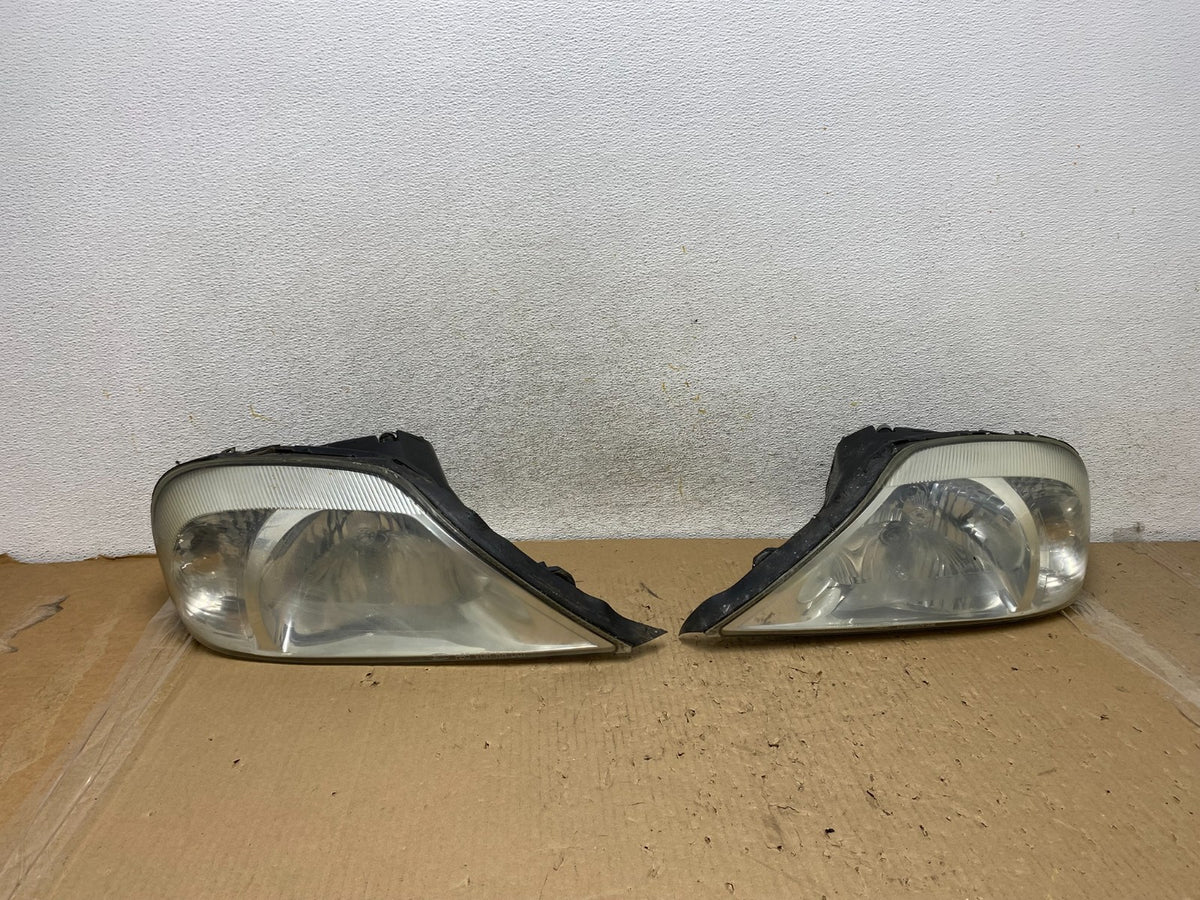2000 to 2005 Mercury Sable Left+Right Side Halogen Headlights AH2849 DW0