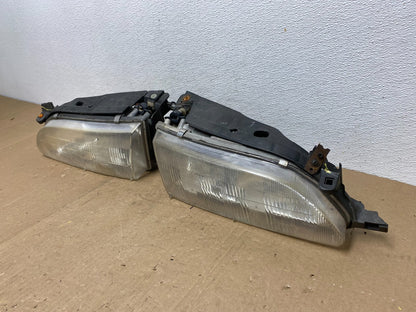 1993 to 1997 Toyota Corolla Left+Right Side Headlights AC5821 DW1