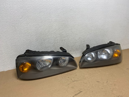 2004 to 2006 Hyundai Elantra Left+Right Set Halogen Headlights AG4086 DW2