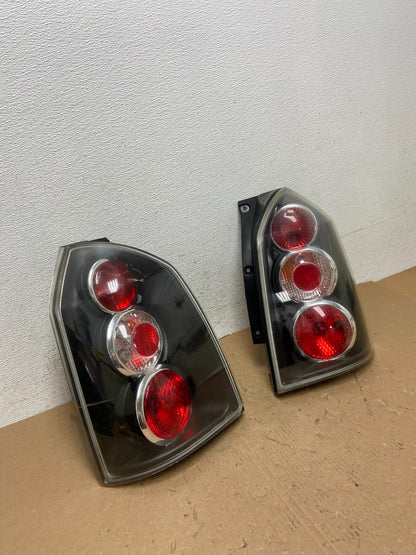 2005 to 2009 Hyundai Tucson Left+Right Side Black Tail Lights AD8052 DG2