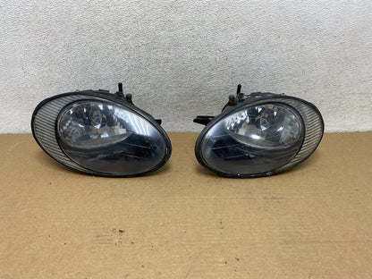1996 to 1999 Ford Taurus Left+Right Side Headlights AH4413 DW0