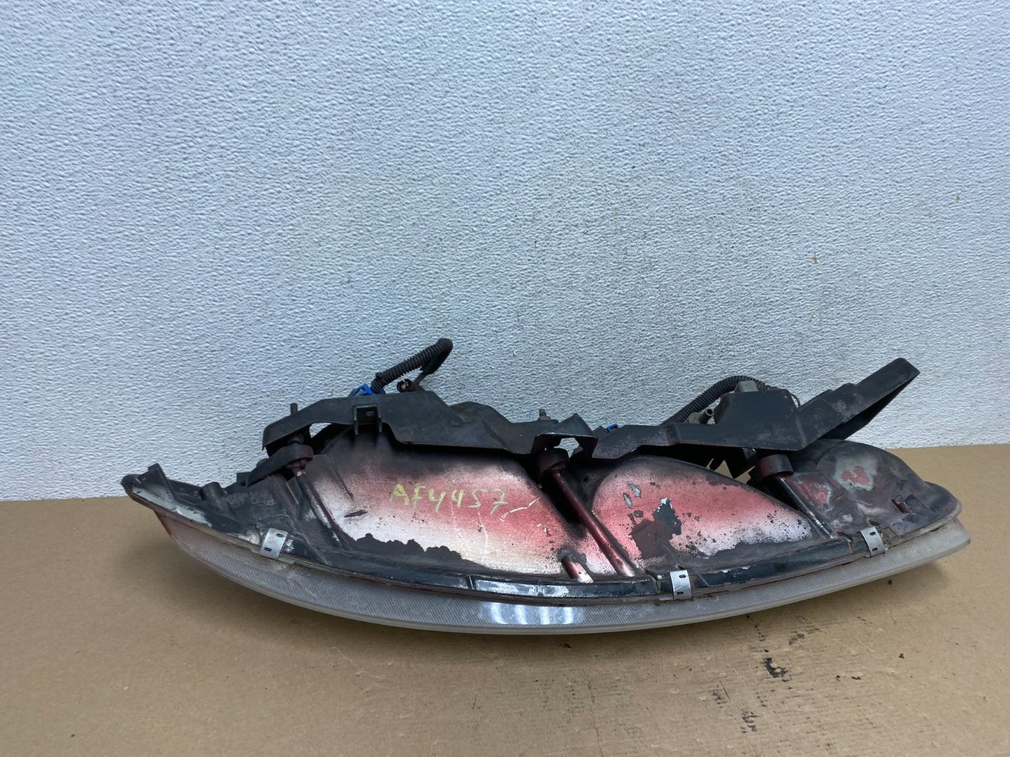 1995 to 1999 Oldsmobile Aurora Left Driver LH Side Headlight AF4457 DW6
