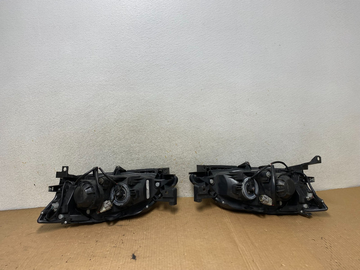 2008 to 2011 Subaru Impreza Left+Right Side Halogen Headlights TYC AI8815 DW7