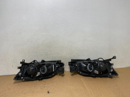 2008 to 2011 Subaru Impreza Left+Right Side Halogen Headlights TYC AI8815 DW7